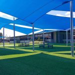 Huge grass with shade sails