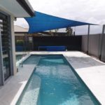 Small blue shade with pool — Shade Sails in Edmonton, QLD
