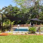 Pool surrounded with plants — Shade Sails in Edmonton, QLD